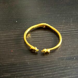 Gold bracelet with elephants